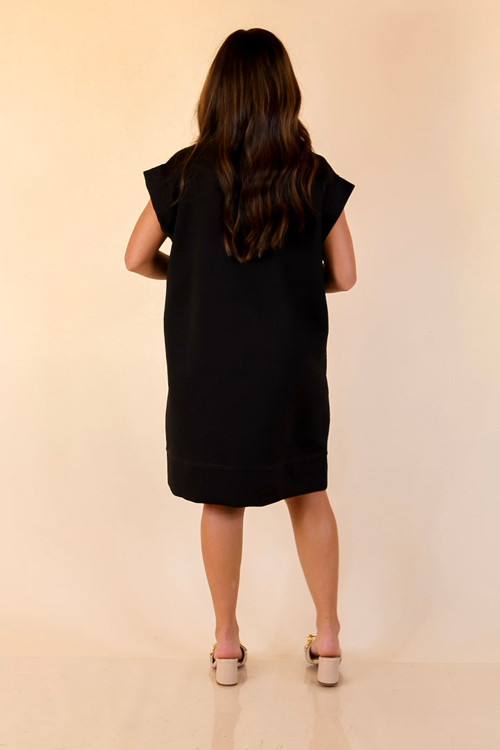Modern Classic Cap Sleeve Dress with a Collar and Textured Detailing Dress in Black