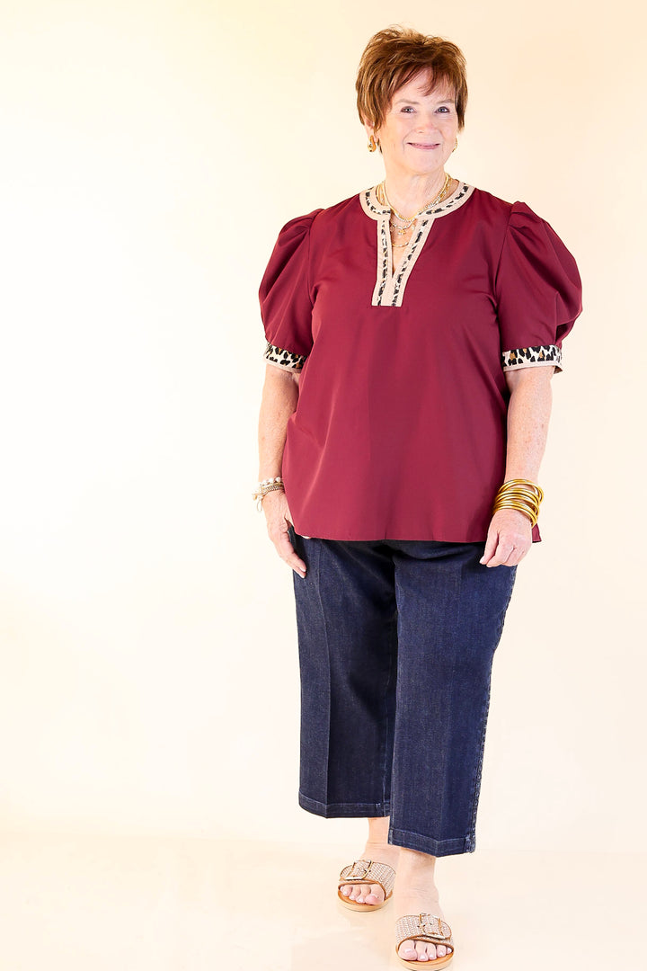 Standout Style V Neck Top with Short Balloon Sleeves and Leopard Print Trim in Maroon
