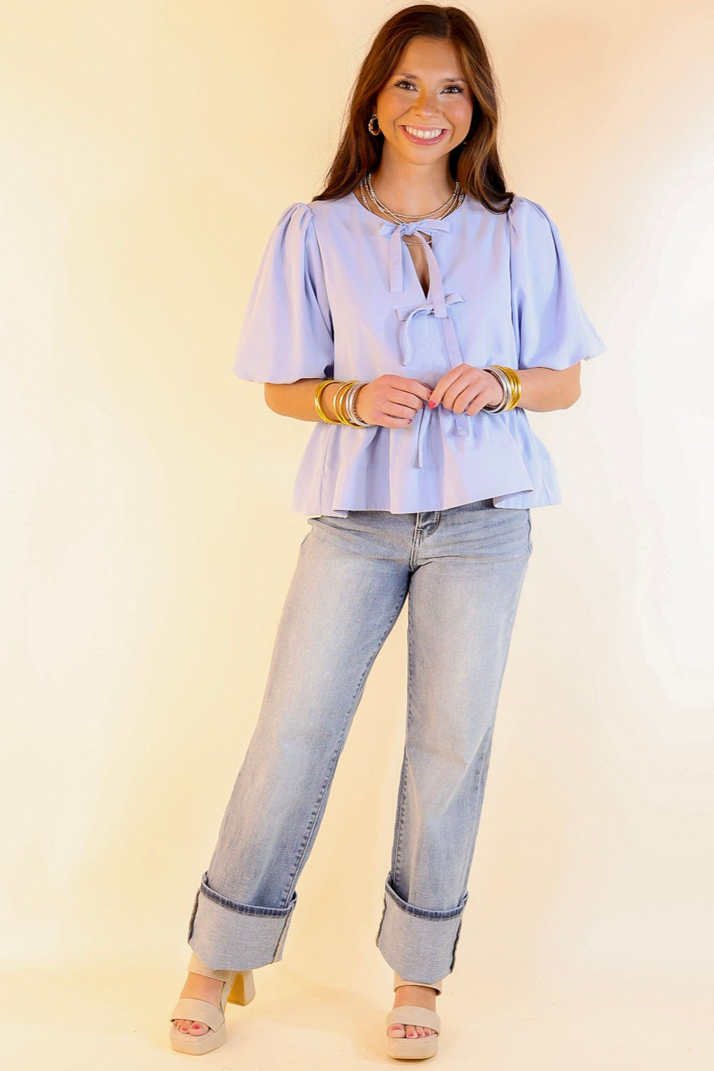 Simply Stunning Short Puff Sleeve Peplum Top with Bow Tie Detailing in Baby Blue