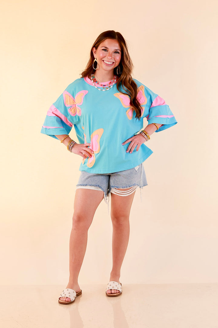 Dream in Color Butterfly Print Relaxed Short Sleeve Top with Contrast Sleeves in Turquoise Blue