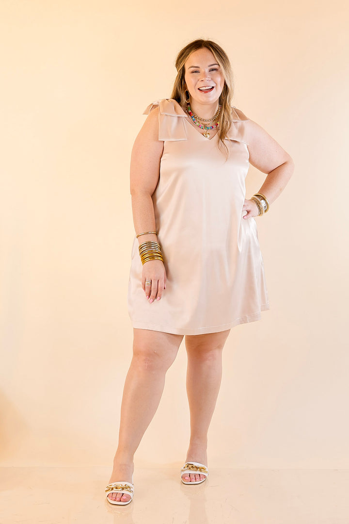 Satin Soirée V Neck Mini Dress with Bow Strap Detailing in Champagne