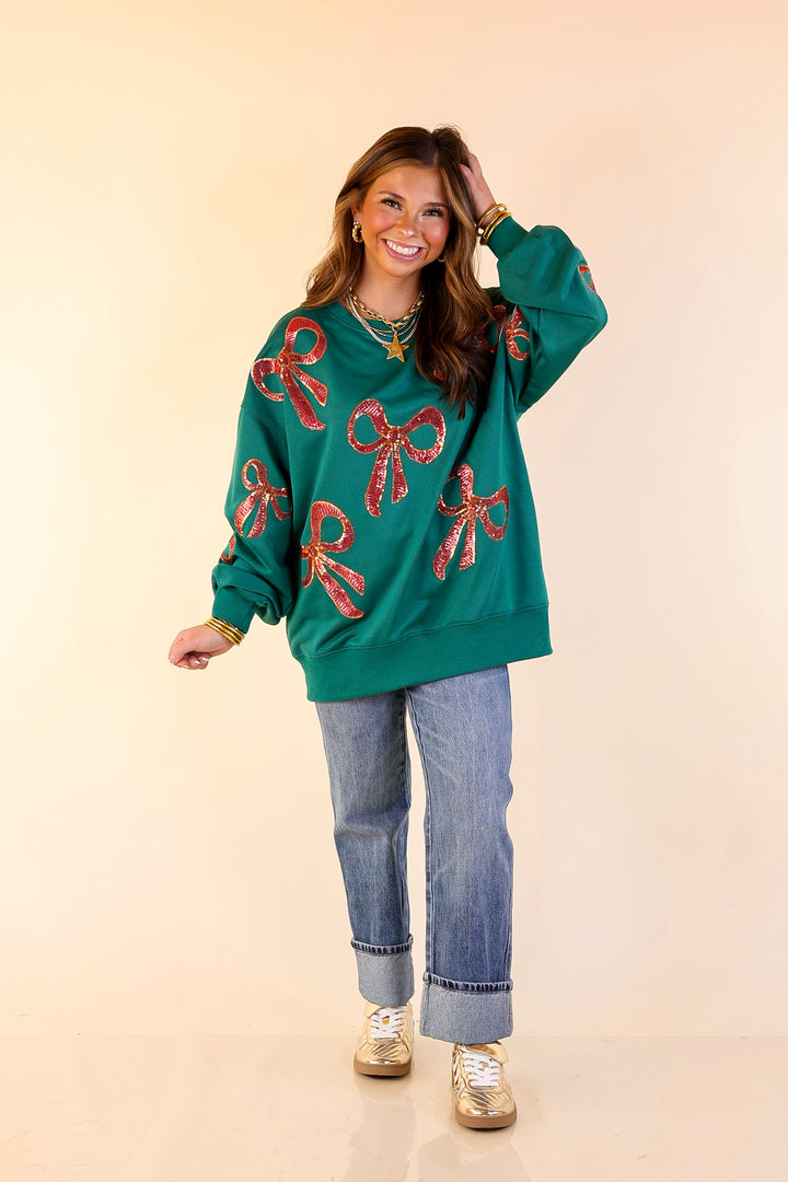 Wrapped in Style Crewneck Sweatshirt with Sequin Red Bows in Dark Green