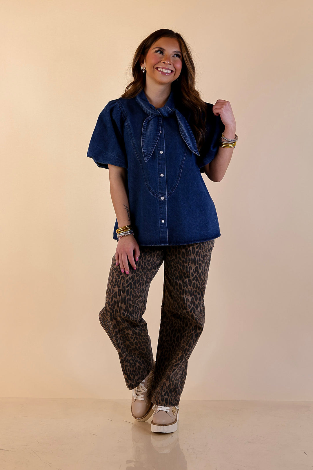 Tie the Moment Denim Pearl Snap Button Front Top with Statement Tie Neckline and Puff Sleeves in Medium Wash