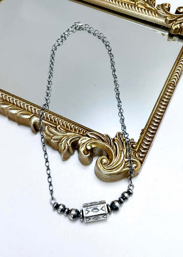 Sterling silver Native American necklace with single barrel bead and Navajo pearl accents, minimalist western jewelry