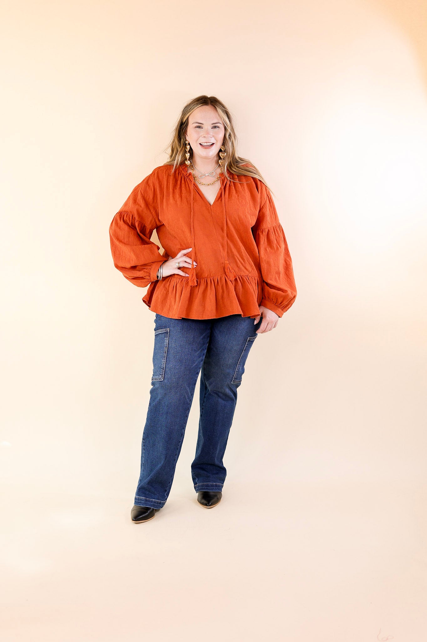 Free Fallin' Textured Long Sleeve Peplum Top with Keyhole Front in Orange