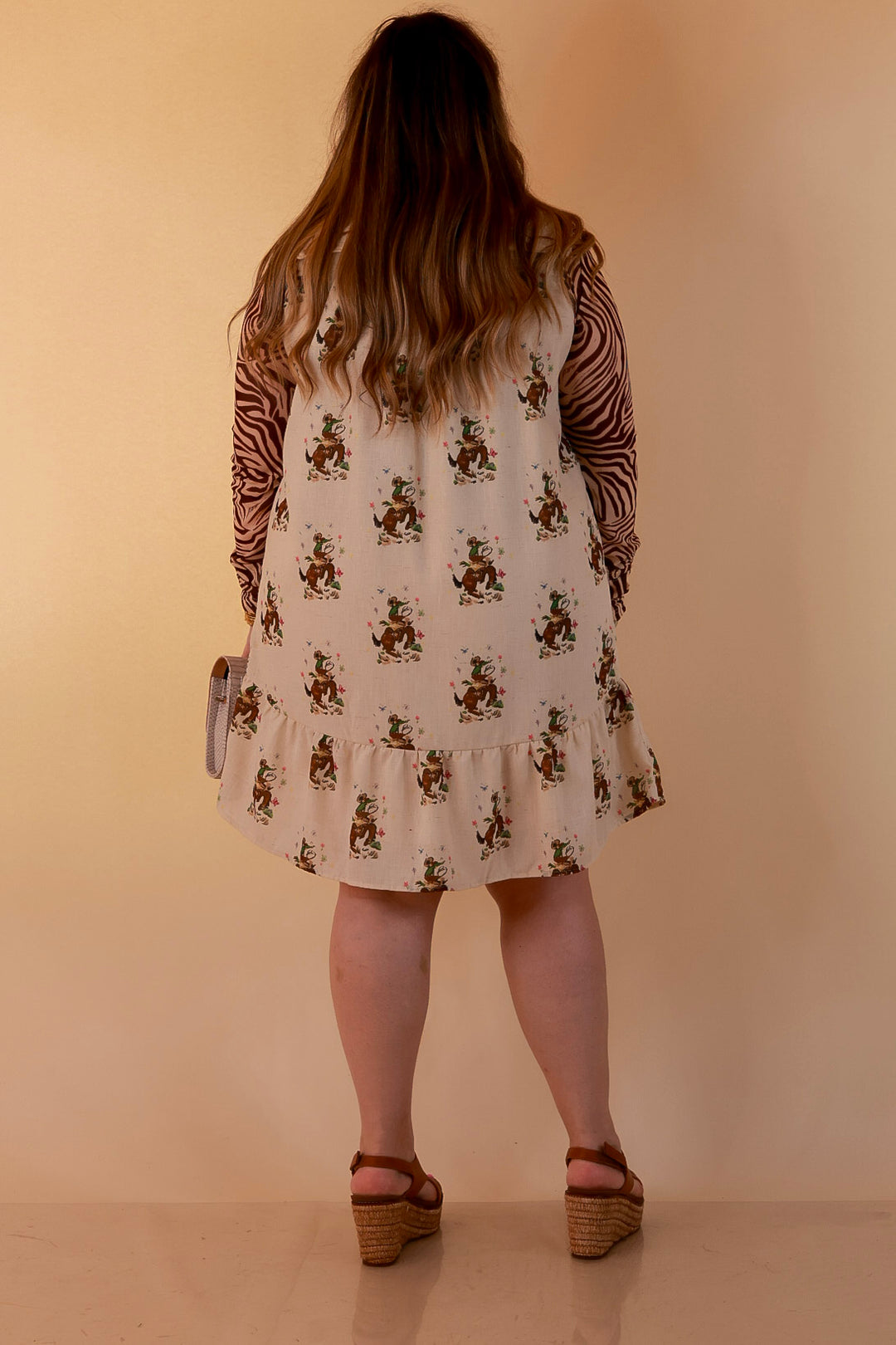 The Showstopper Sleeveless Pearl Snap Bronc Print Ruffle Dress with Sailor Collar and Horseshoe Embroidery in Cream