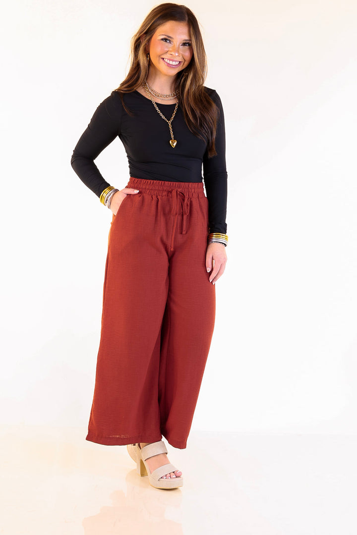 On Repeat Cropped Drawstring Woven Pants in Rust Orange