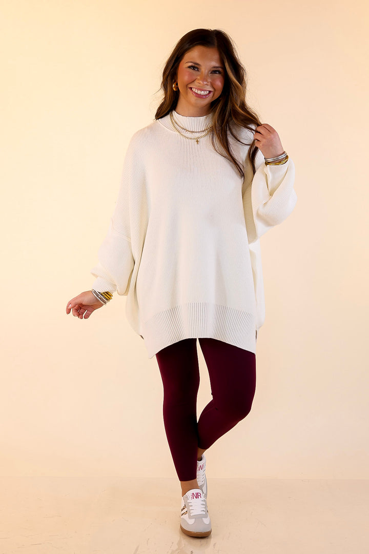 Snug and Stylish Mock Neck Sweater with Side Slit in Ivory
