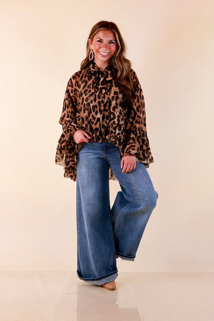 Flirt Factor Long Sleeve Sheer Blouse with Bell Sleeves and Ruffle Detailing and Tie Collar in Leopard Print