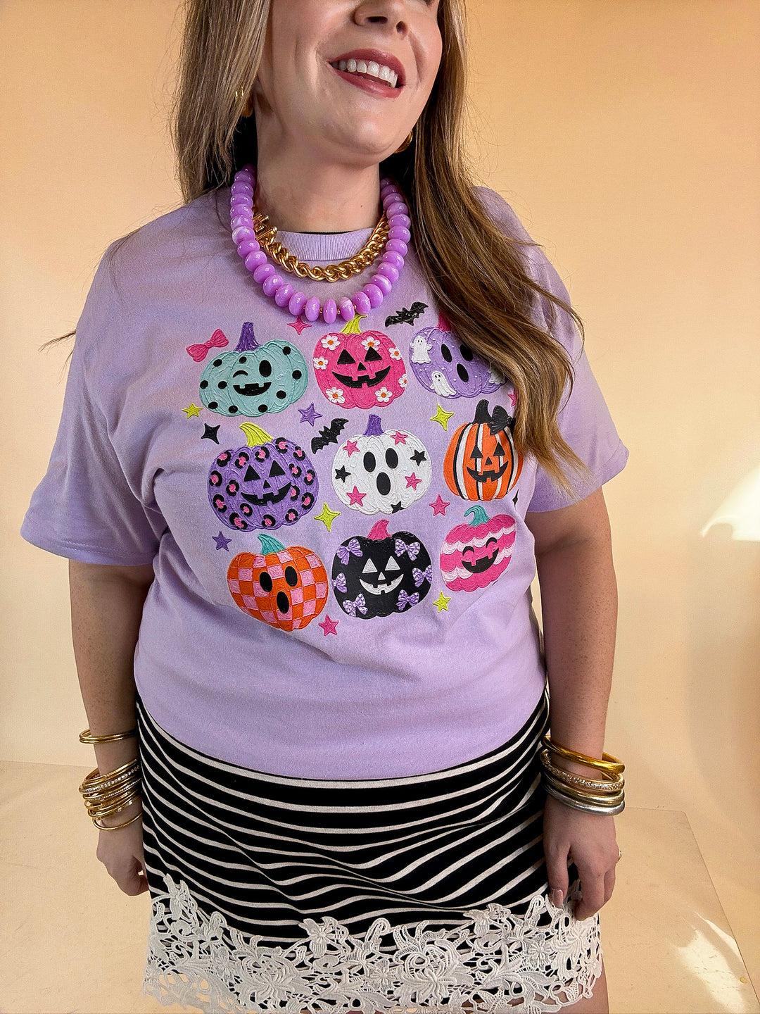 The Pumpkin Club Colorful Jack-O’-Lantern Halloween Graphic Tee in Lavender Purple