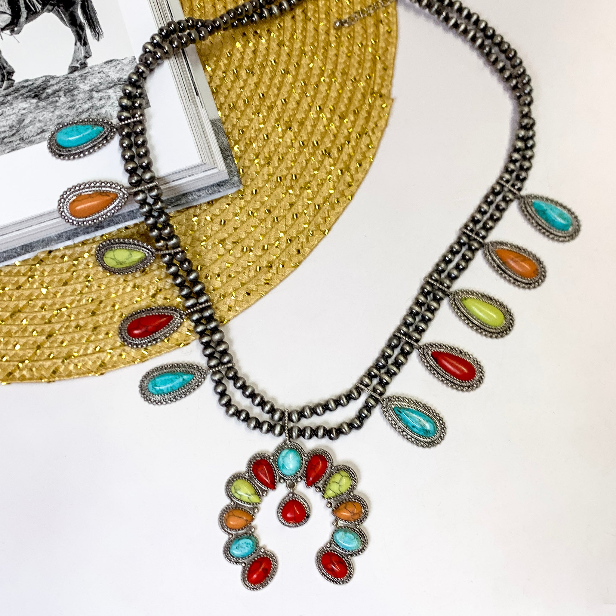 She's Gone Country Necklace with Naja Pendant and Faux Stone Dangle in Multicolor