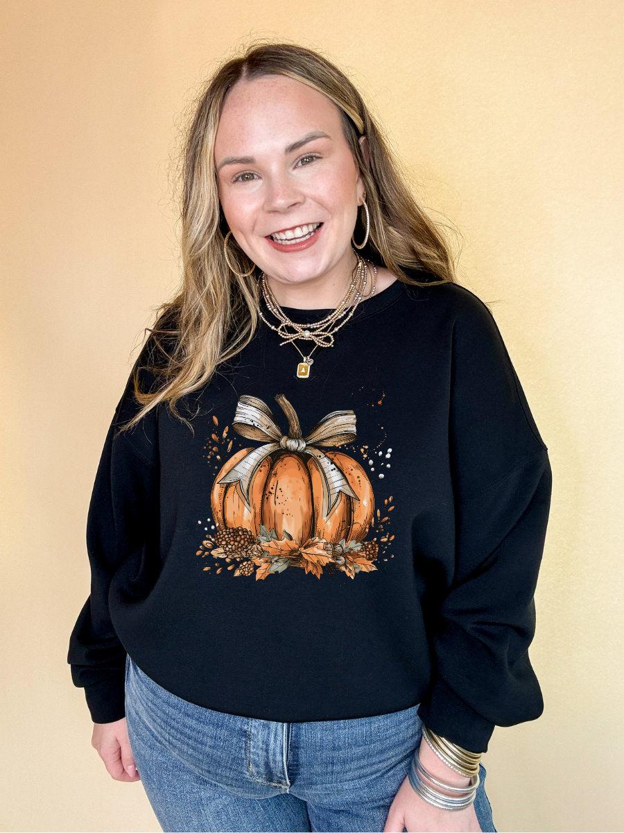 Online Exclusive | Chic Autumn Pumpkin on a Bed of Leaves with Off White Bow Graphic Sweatshirt in Multiple Color Options