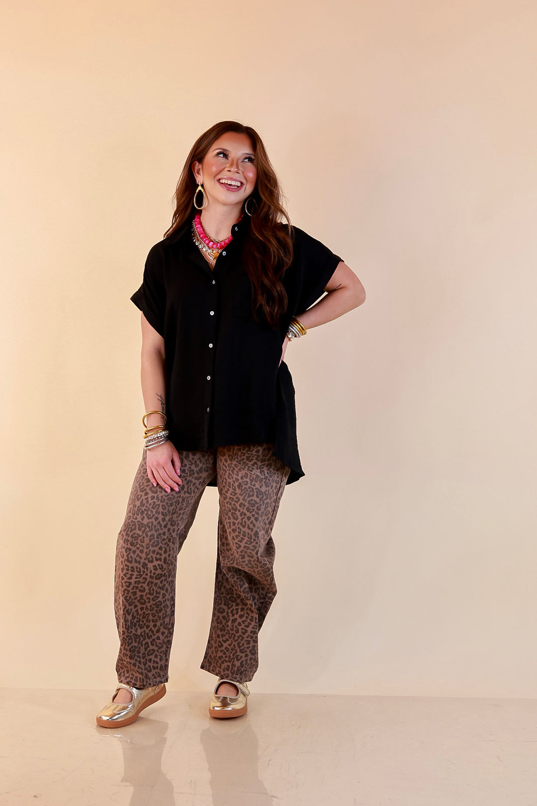Timeless Appeal Woven Airflow Button Front Top with Rolled Cuff Short Sleeves and Front Pocket in Black