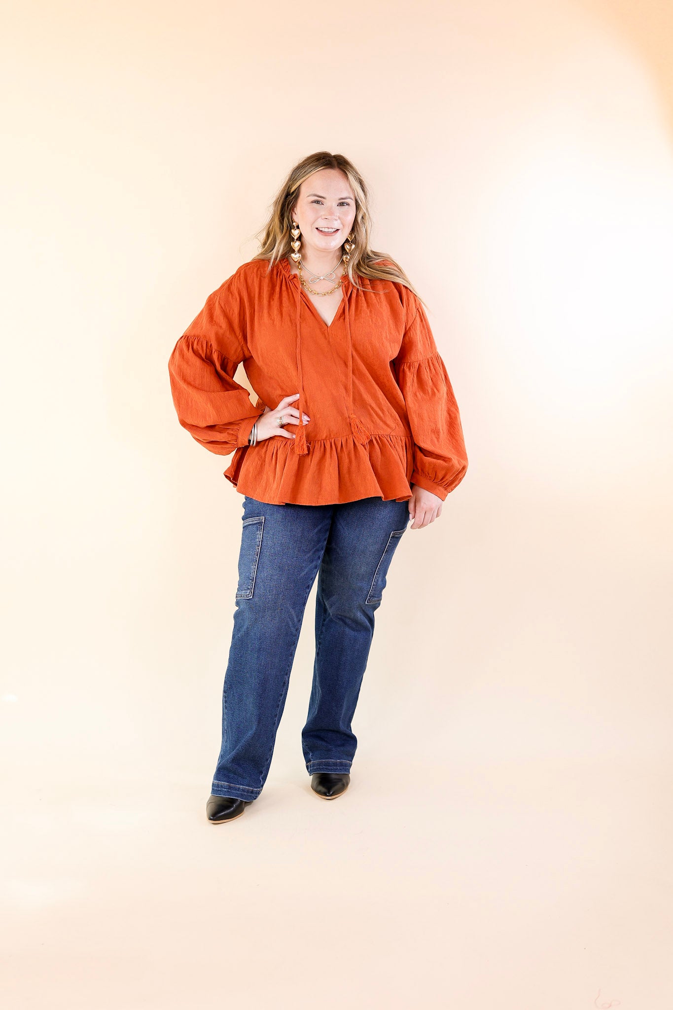 Free Fallin' Textured Long Sleeve Peplum Top with Keyhole Front in Orange