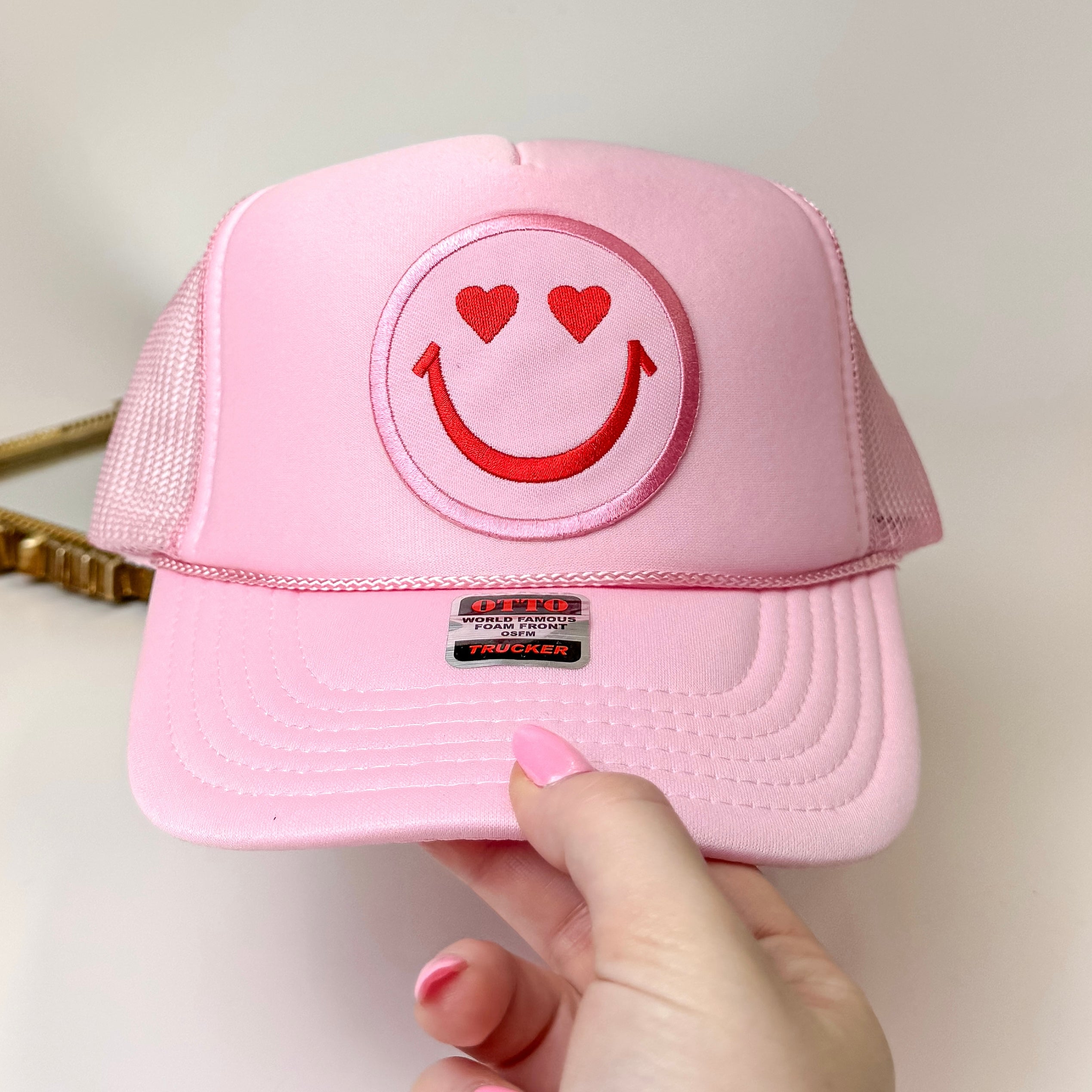 Heart Eyes Happy Face Foam Trucker Hat in Light Pink - Giddy Up Glamour Boutique