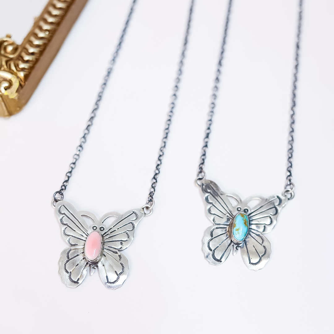 Sterling silver butterfly necklace with pink conch and turquoise stone options on a 20-inch chain, Native American made and stamped Toadlena.