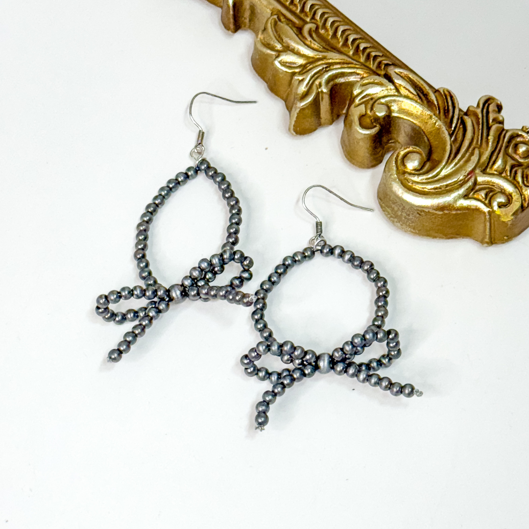 Faux Navajo Pearl Bow Earrings 🎀 western cowgirl jewelry, silver beaded bow design lightweight dangle earrings.