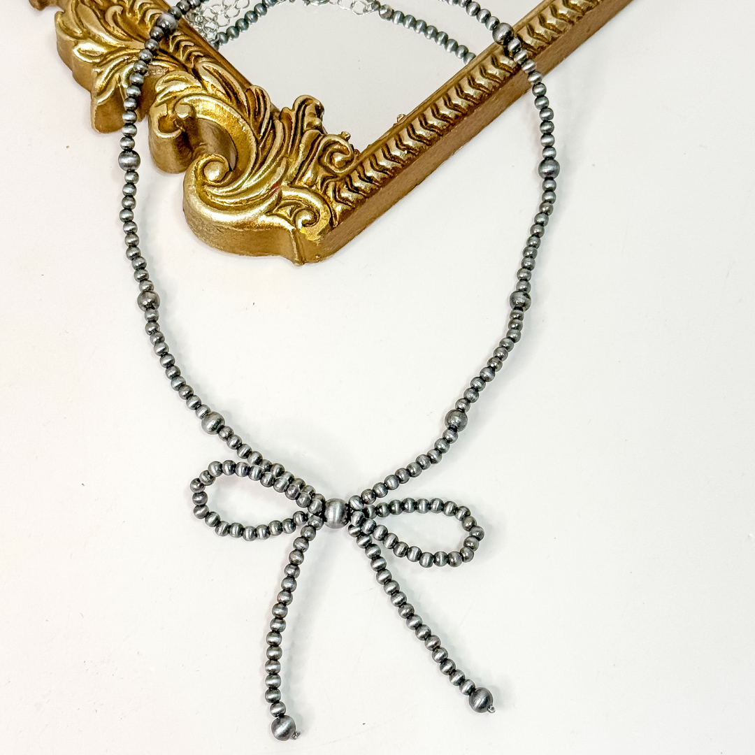 Faux Navajo Pearl Graduated Bow Necklace 🎀 western cowgirl jewelry, 16-inch silver beaded bow design with graduated 4–6mm faux pearls and 3-inch extender.