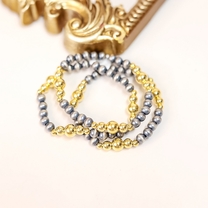 Stretch bracelet with 6mm sterling silver Navajo pearls and 14K gold-filled beads, handmade and designed for easy everyday wear.