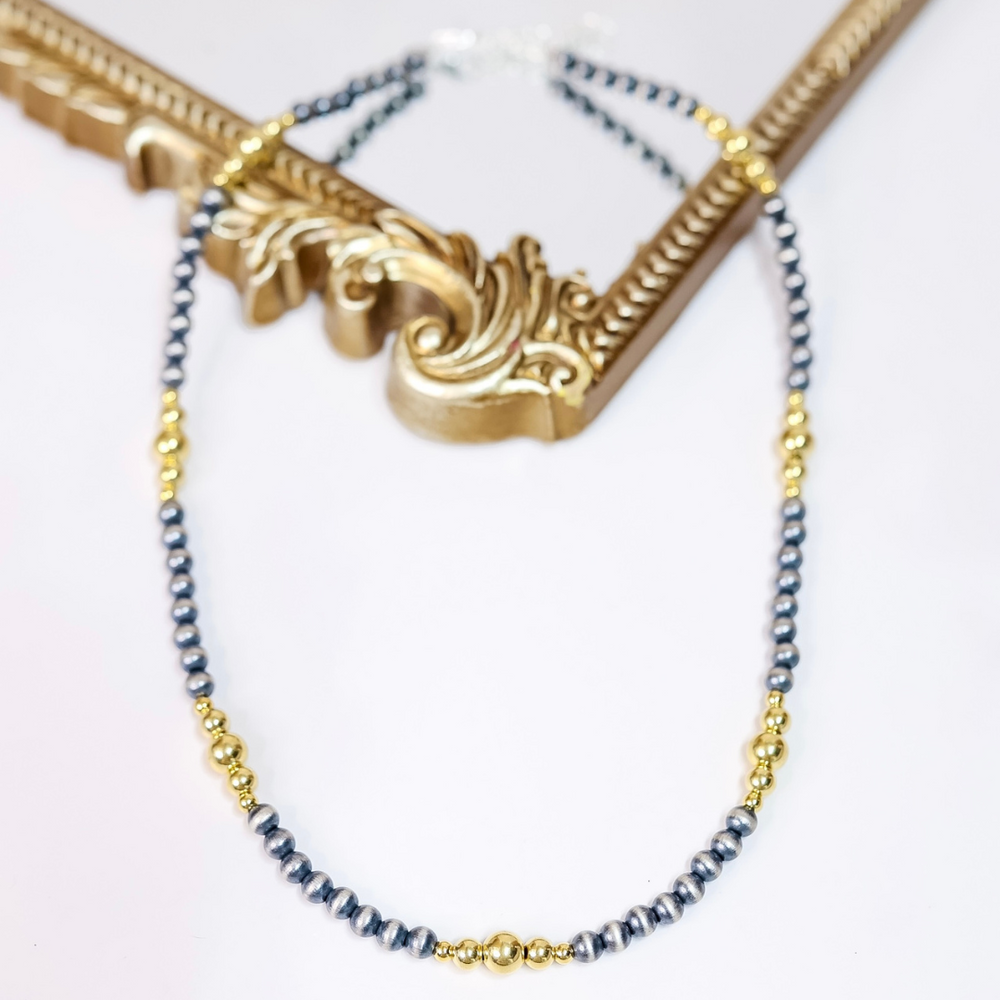 Hand-strung Navajo pearl and 14K gold-plated bead necklace with 6mm silver pearls and mixed gold accents, 20 inches long with adjustable 2-inch extender.