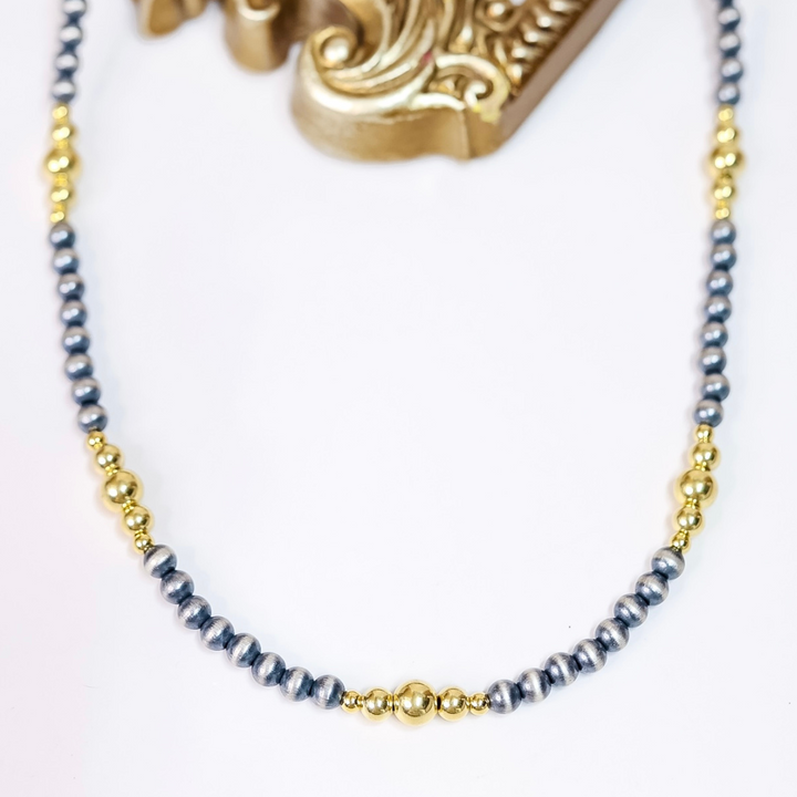 Hand-strung Navajo pearl and 14K gold-plated bead necklace with 6mm silver pearls and mixed gold accents, 20 inches long with adjustable 2-inch extender.