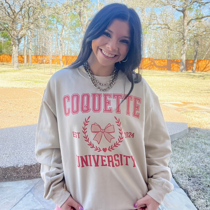 Online Exclusive | Coquette University Long Sleeve Graphic Sweatshirt in Cream - Giddy Up Glamour Boutique