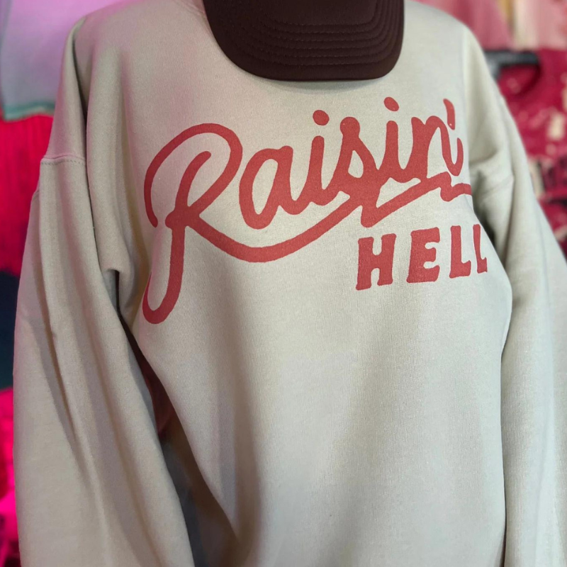 Online Exclusive | Raisin' Hell Long Sleeve Graphic Sweatshirt in Cream - Giddy Up Glamour Boutique
