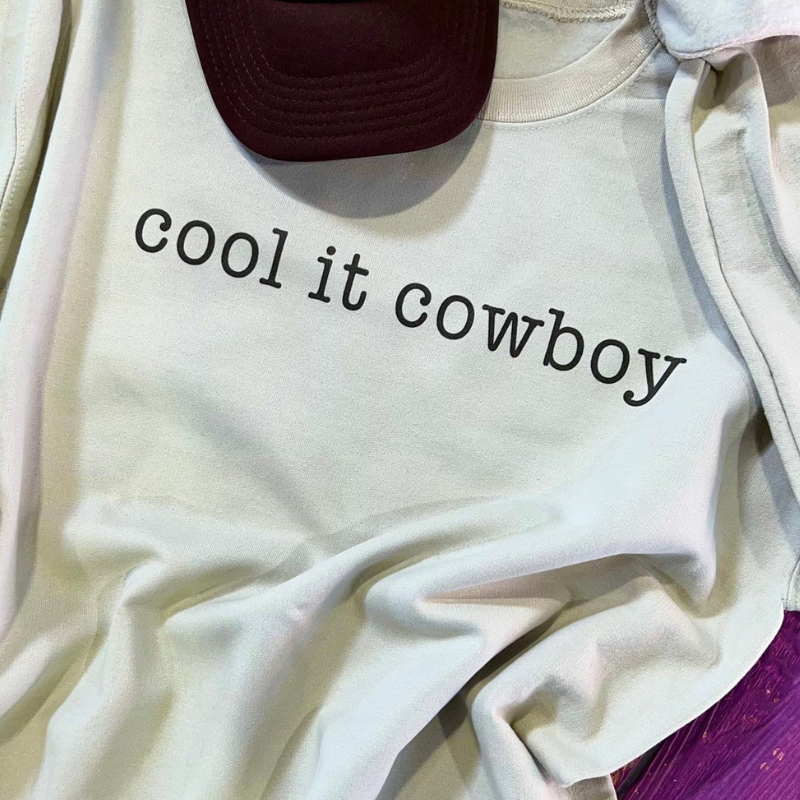 Online Exclusive | Cool It Cowboy Long Sleeve Graphic Sweatshirt in Cream - Giddy Up Glamour Boutique
