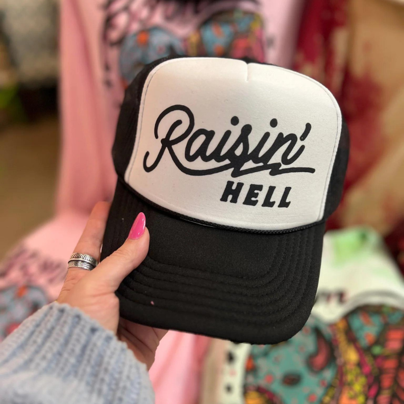 Online Exclusive | Raisin' Hell Foam Trucker Cap in Black and White - Giddy Up Glamour Boutique