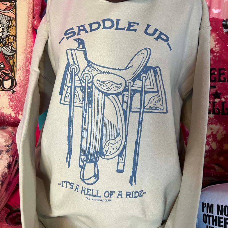 Online Exclusive | It's A Hell of a Ride Long Sleeve Graphic Sweatshirt in Cream - Giddy Up Glamour Boutique