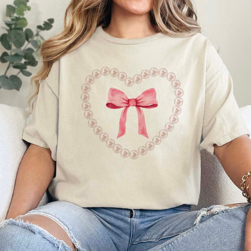 Online Exclusive | Pearl Heart Bow Coquette Short Sleeve Graphic Tee in Cream - Giddy Up Glamour Boutique