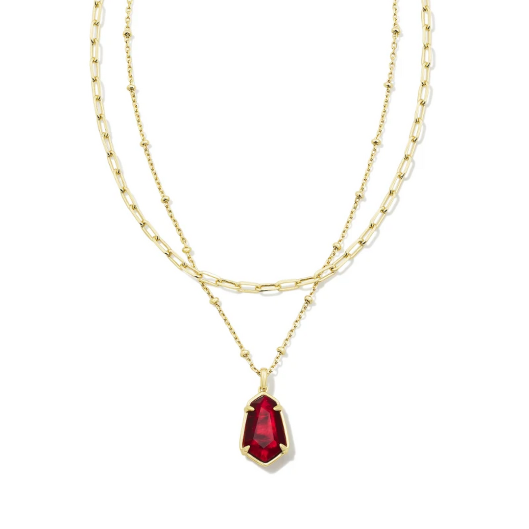 This Alexandria Gold Multi Strand Necklace in Cranberry Illusion by Kendra Scott is pictured on a white background.