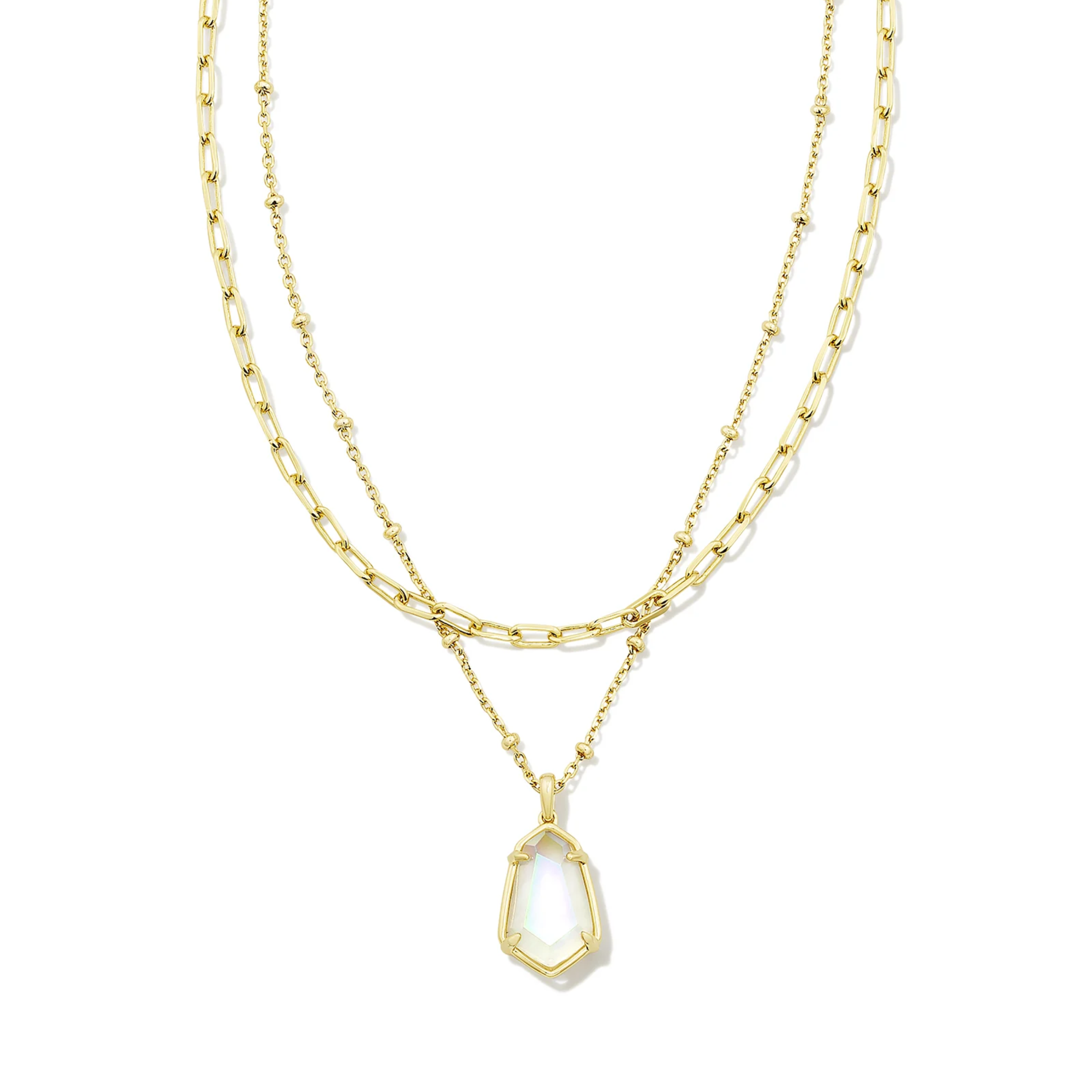 This Alexandria Gold Multi Strand Necklace in Iridescent Clear Rock Crystal is pictured on a white background.