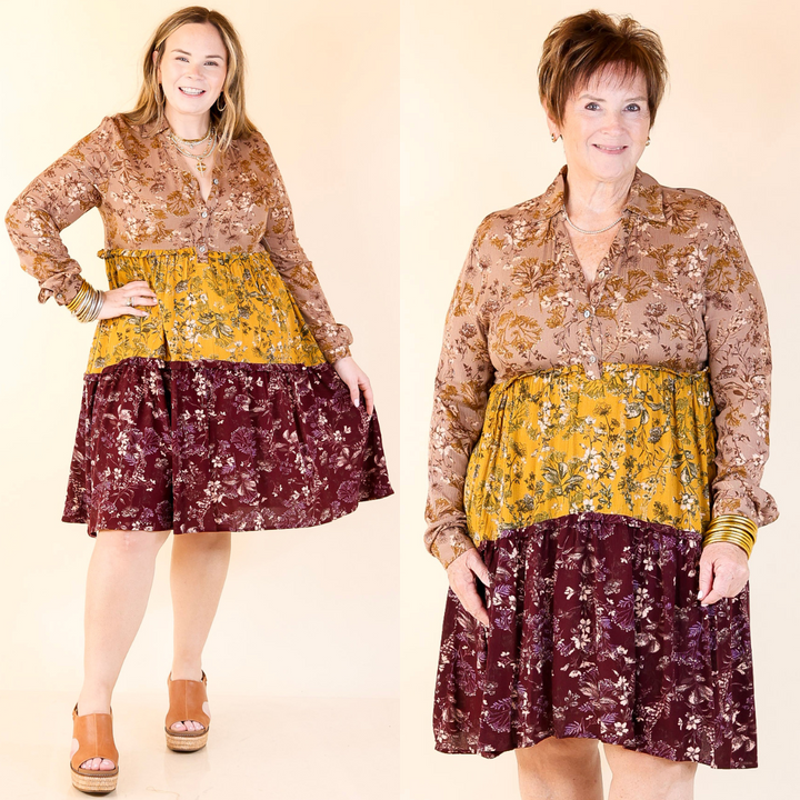 Two women wearing a dress with a floral pattern on a beige background
