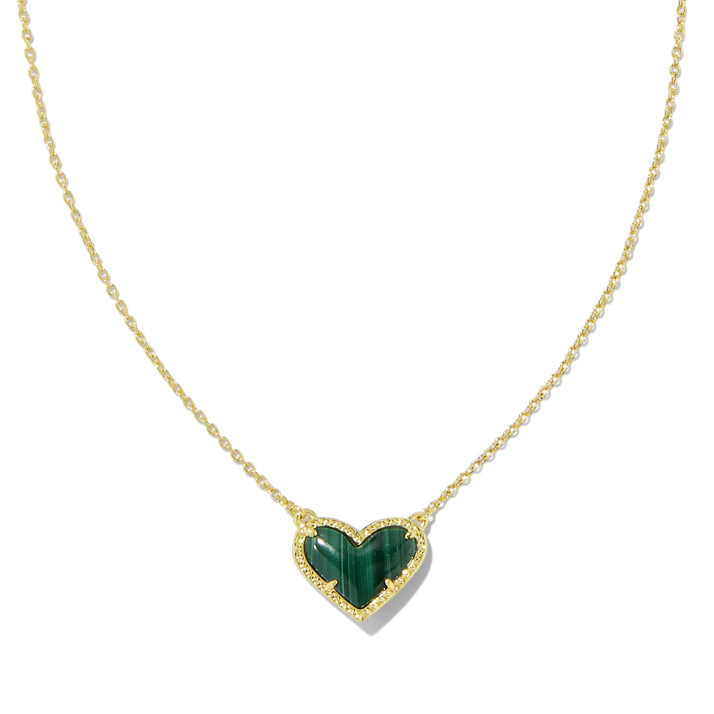 This Ari Heart Gold Short Pendant Necklace in Green Malachite by Kendra Scott is pictured on a white background.