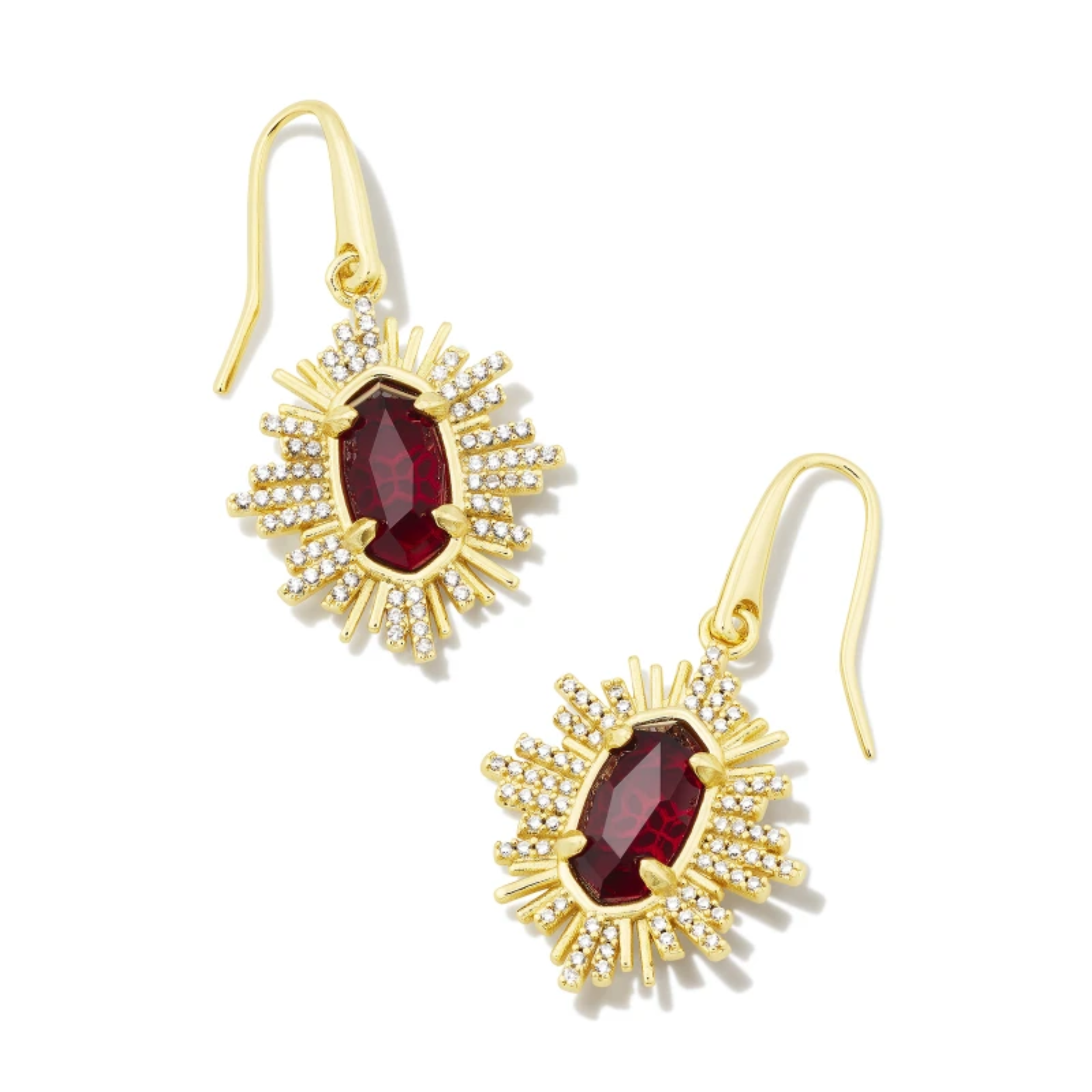 These Grayson Sunburst Gold Drop Earrings in Red Glass by Kendra Scott are pictured on a white background.