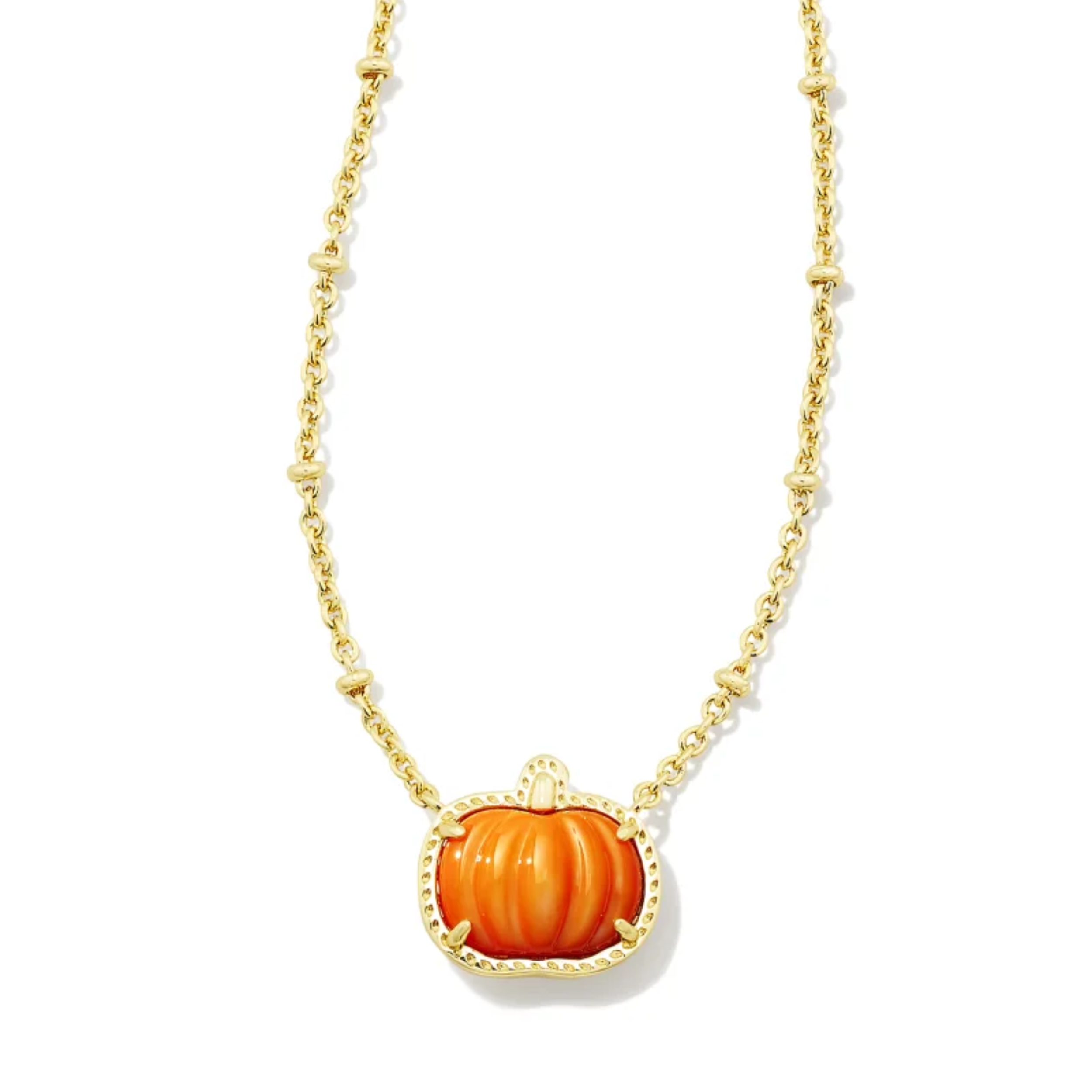 This Pumpkin Gold Short Pendant Necklace iin Orange Mother-Of-Pearl by Kendra Scott is pictured on a white background.