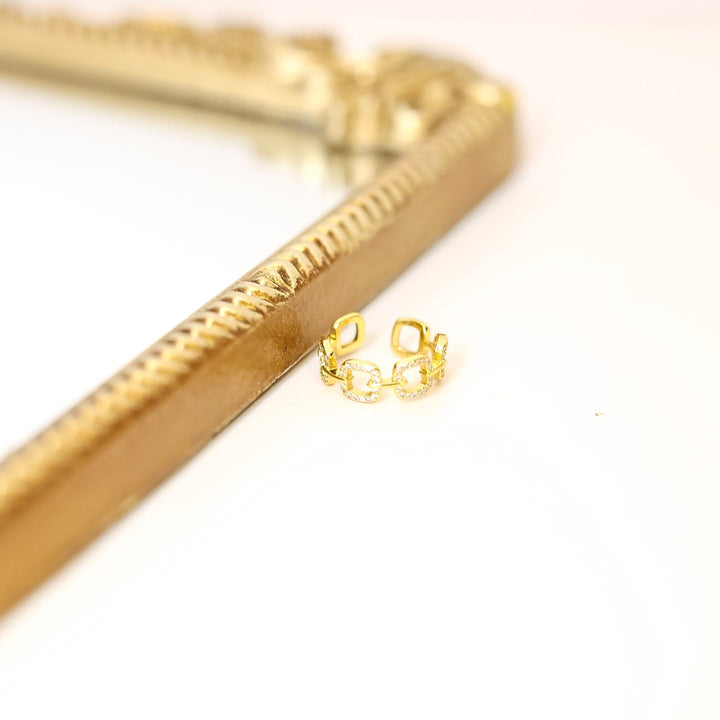 Gold ring on a white background