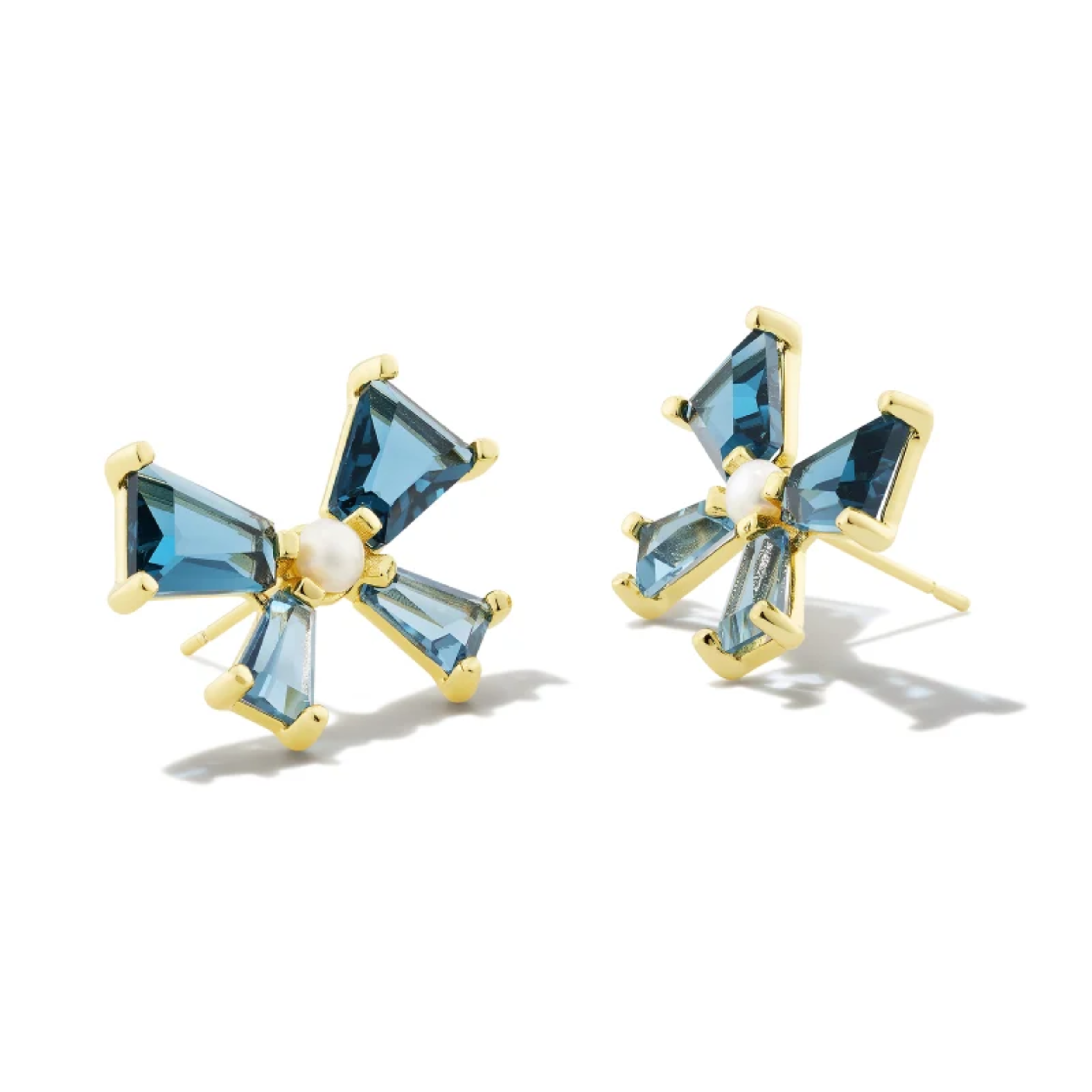 These Blair Bow Gold Stud Earrings in Teal Mix by Kendra Scott are pictured on a white background.