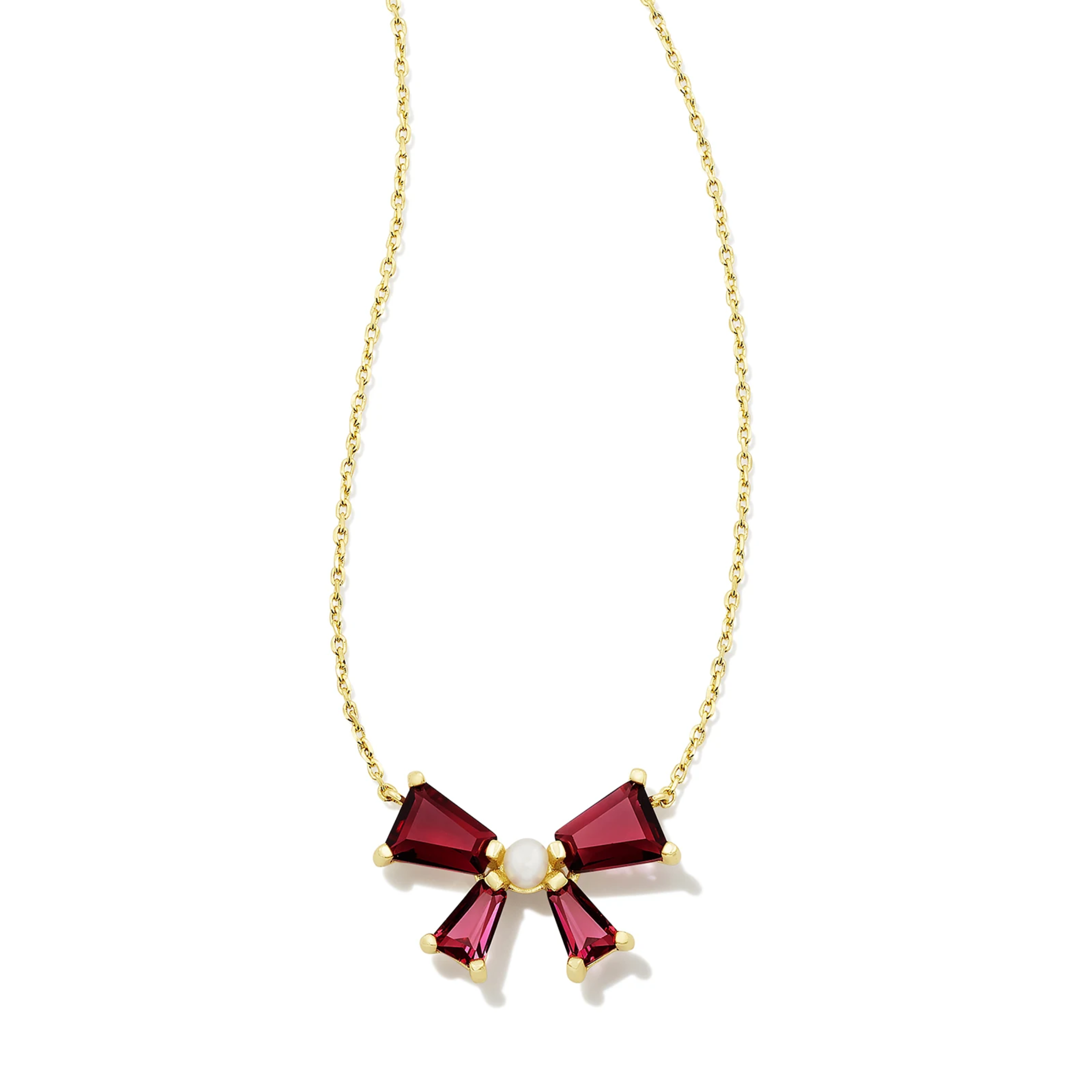 This Blair Gold Bow Pendant Necklace in Red Mix by Kendra Scott is pictured on a white background.