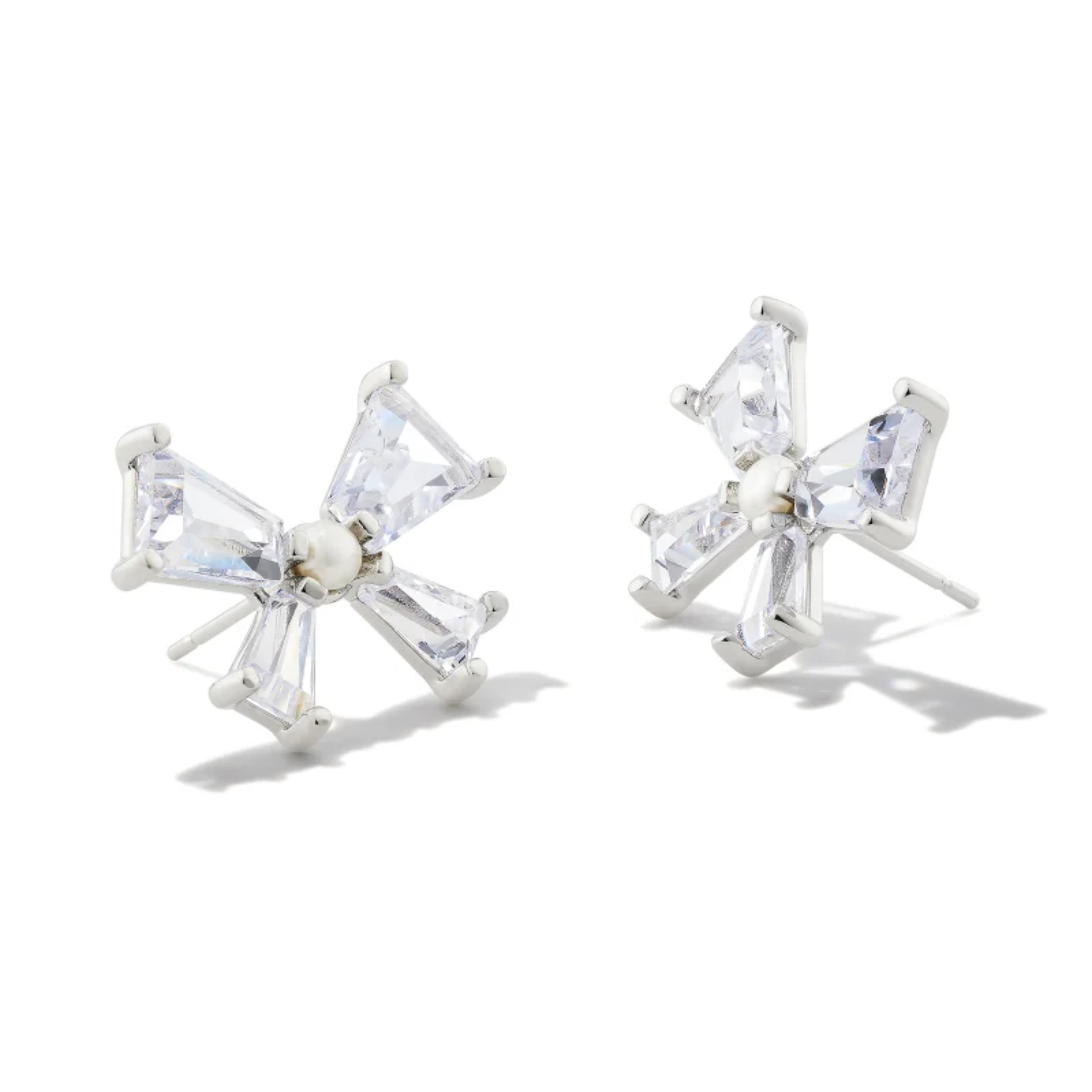 These Blair Silver Bow Stud Earrings in white by Kendra Scott are pictured on a white background.