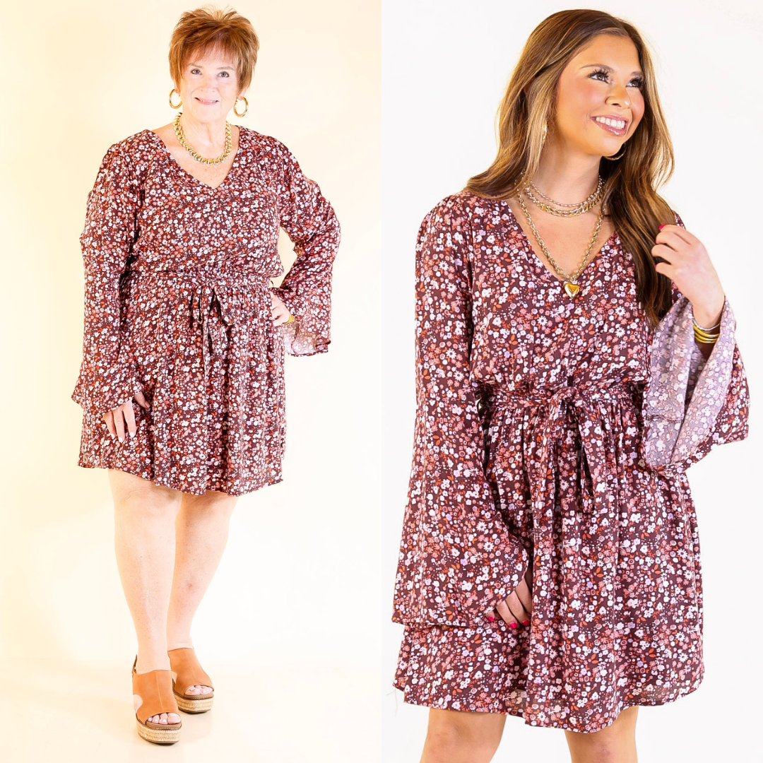 Two women wearing a maroon floral dress against a plain background