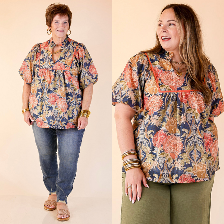 Two women wearing floral tops and jeans on a beige background