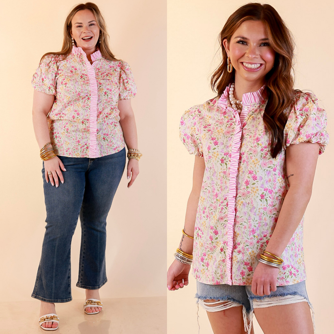 Models are wearing Short Puff Sleeve Ruffle Trim Button Front Floral Peplum Top in Pink with bottoms against a beige backdrop. 