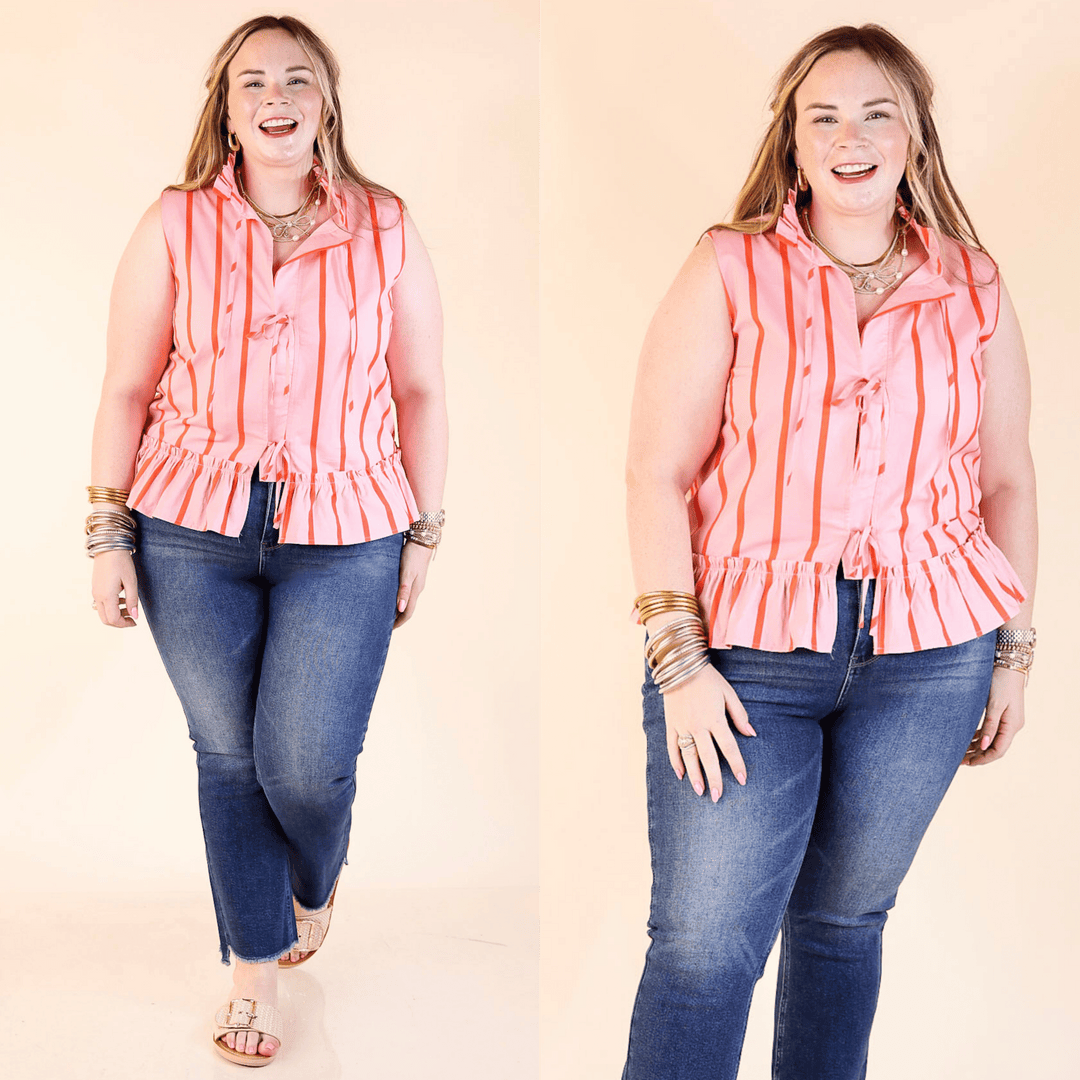 Flirty and flattering, the Bow Babe Blouse features classic stripes, a ruffle collar, self-tie front, and peplum hem for an effortlessly sweet look. Sizes small to large.