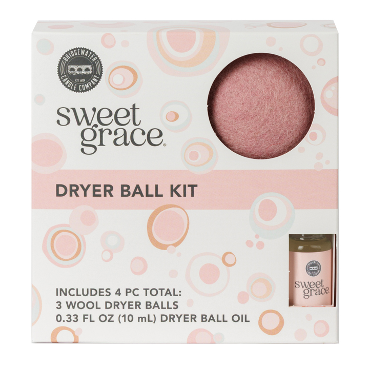 Sweet Grace dryer ball kit packaging with dryer balls and oil on a white background