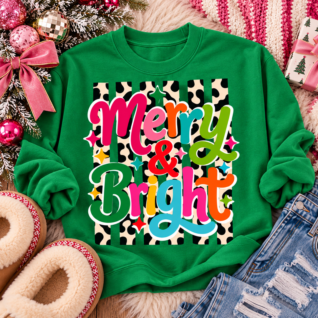 Bright Merry Leopard Christmas graphic tee or sweatshirt on kelly green with colorful Merry and Bright script over a leopard print block