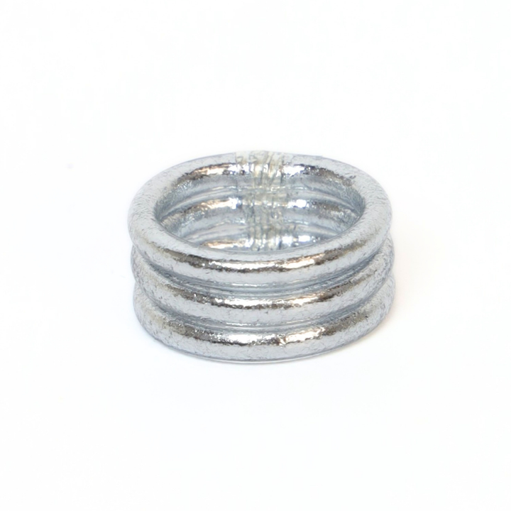 Set of three silver rings stacked on a white background
