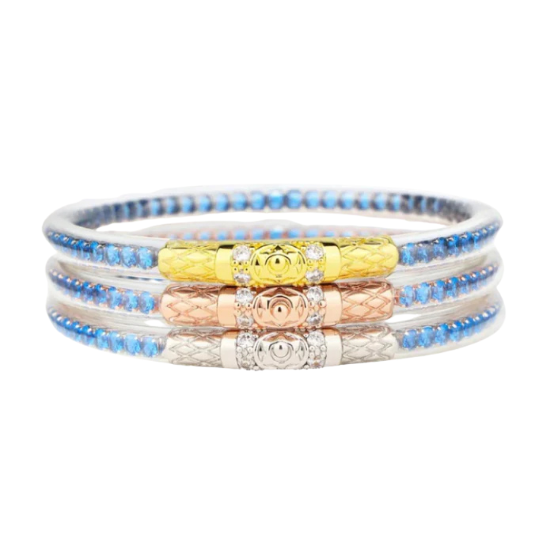 Set of three beaded bracelets with colorful beads on a white background