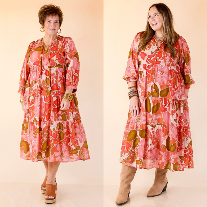 Two women wearing matching pink floral dresses on a beige background